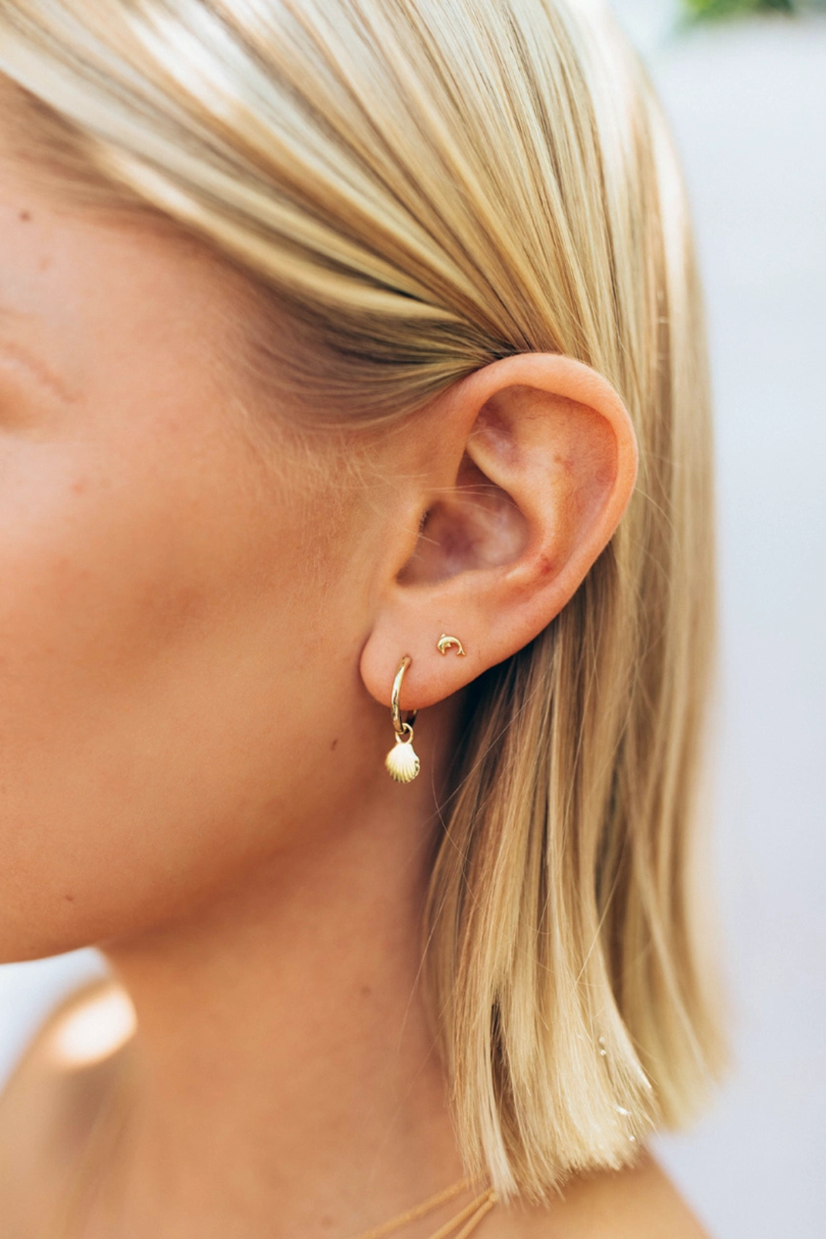 Dainty gold hoop earrings with seashell charm hypoallergenic